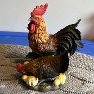 Rooster hen and chicks